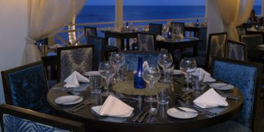 Aqua Terra Restaurant table with sea view, Barbados